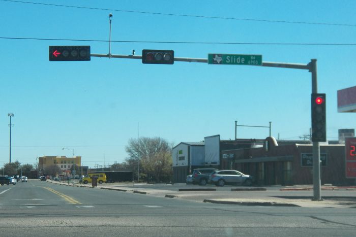 Another traffic Signal setup
In Lubbock, they look like this typically anywhere you go in the city, with the highway shield on the sign if the road it is signing is a state maintained road (or US highway or interstate) and horizontal, probably because of the wind, my whole trip the past two days was just fighting wind so. xD

This is in Lubbock, Texas.
