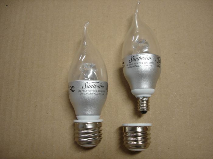 Sunbeam 4W LED
Here is a pair of Sunbeam 4W LED Enviro-Bulb decorative chandelier lamps with E12 candelabra to E26 medium adapters.


Made in: China

Manufactured: November 2010

Lumens: 200

Lamp life: 20,000 hours

Colour temp: 3000K

CRI: 80

Voltage: 120V

Current: 50 mA

Lamp shape: CA12
