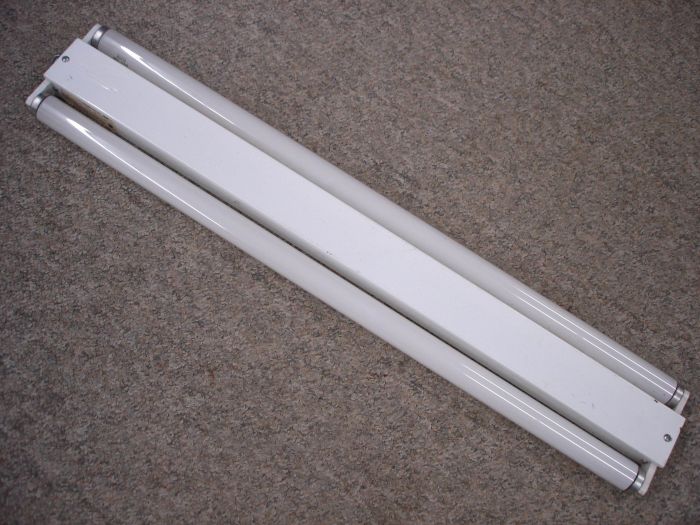 Fluorescent Fixture
Here is a Mid-Day Lighting two lamp side mount fluorescent fixture for F30T12 lamps. 

Made in: Mississauga, Ont. Canada

Manufactured: Circa 1986

Voltage: 118V

Current: 0.80A


