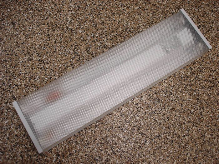 Canarm Fluorescent Fixture
Here is a Canarm Greenchoice 2 ft T8 fluorescent wrap.

Made in: China

Manufactured: April 06, 2014

Voltage: 120V

Current: 0.56A
