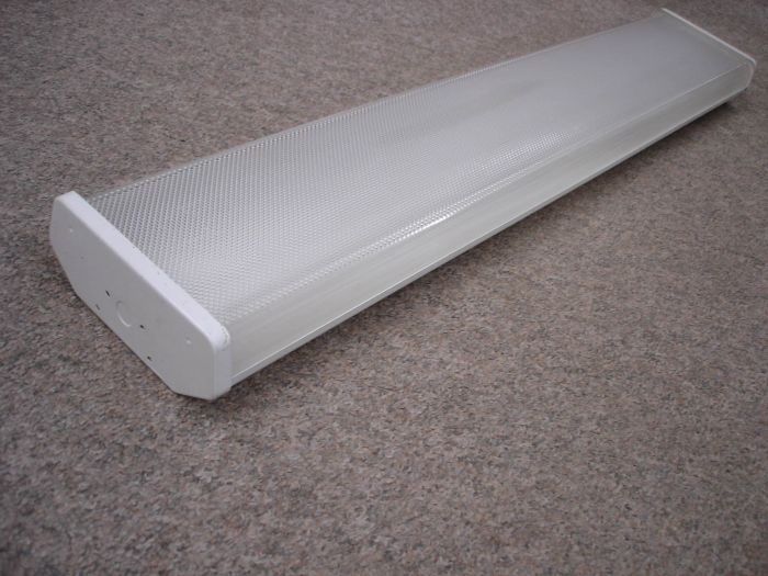 Westinghouse Fluorescent Fixture
A Westinghouse Canada 4 foot fluorescent wrap fixture.

Made in:  Cambridge, Ont. Canada

Voltage: 120V

Current: 0.78A

