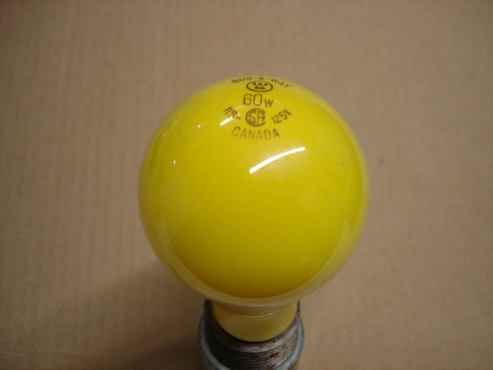 Westinghouse 60W 
Here's a Westinghouse Canada with a W logo on the etch 

60W Bug-A-Way incandescent lamp.

Made in: Canada

Current: 0.50A

Voltage: 115 -125V

Lamp shape: A19

Base: Medium E26 brass

Filament: C-6
