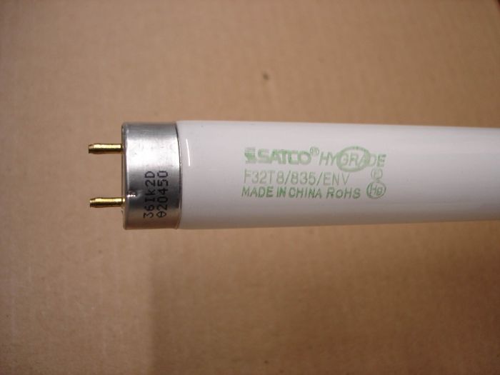 Satco F32T8
Here is a Satco F32T8 Hygrade neutral white fluorescent lamp.

Made in: China

Colour temperature: 3500K

Base: G13 medium bi-pin

Lamp life: 24,000 hours

Lumens: 2950

CRI: 85
