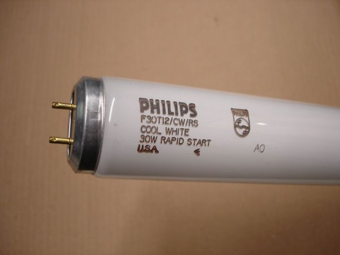 Philips F30T12
Here's a Philips F30T12 cool white rapid start fluorescent lamp.

Made in: USA

Manufactured: January 1990

Lamp life: 18,000 hours

Intial lumens: 2300

Colour temperature: 4100K

CRI: 67
