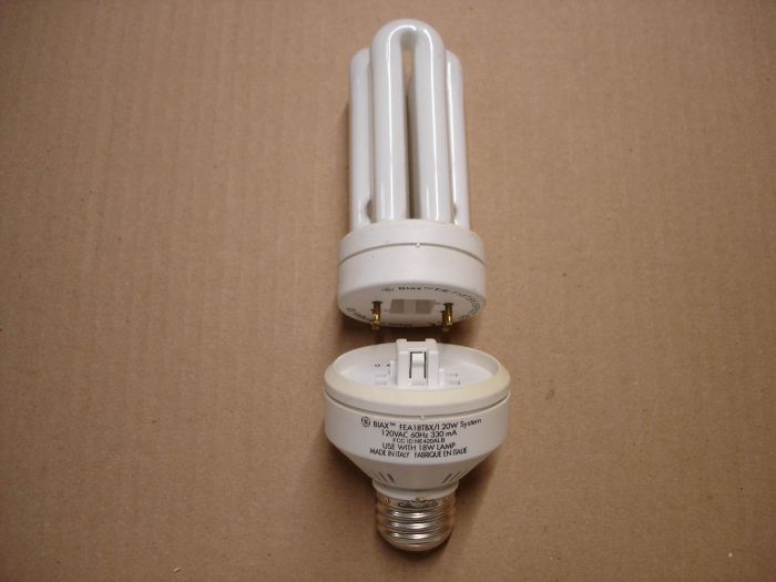 GE 18W
Here is a GE BIAX 18W warm white compact fluorescent lamp and ballast system.

Made in: Ballast Hungary /Lamp Italy

Manufactured: December 1998 (ballast)

Voltage: 120V

Current: 330 mA

Colour temperature: 2700K

Lamp life: 10,000 hours

CRI: 82

Lumens: 1020

Ballast base: Medium E26

Lamp base: GX24q-2

Total system watts: 20W 



