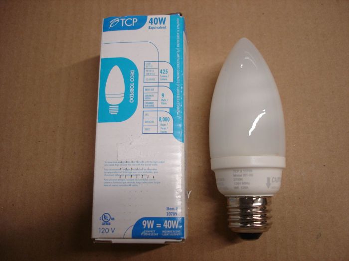 TCP 9W
Here is a TCP 9W warm white Deco Torpedo compact fluorescent lamp. 9W = 40W.

Made in: China

Lamp life: 8000 hours

Colour temperature: 2700K

Lumens: 425

Current: 0.128A

Voltage: 120V
