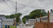 Back_alleys_lit_with_bracket_lights_100W_HPS_pic_2_Winnipeg2C_Man_.PNG