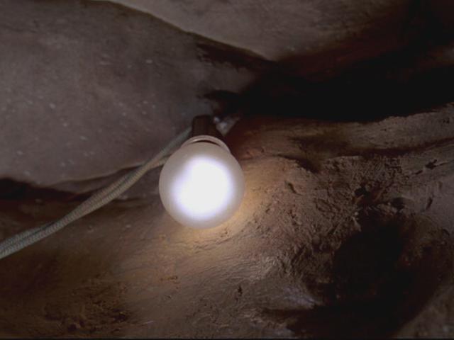 Tunnel Light
Time index: 38:30

Base:[Medium] (one-inch) Edison Screw (E26)
Voltage: 120 Volts

