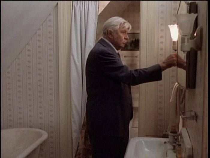 Washroom Sconce Light Fixture (Lit)
Time index: 21:11

Voltage: 120 Volts
Bulb Shape: A19
Base: (Medium one-inch) Edison Screw (E26)
