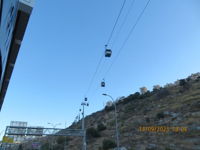 The Rakavlit
[img]https://i.postimg.cc/0203JqW5/IMG-7076.jpg[/img]

This is a gondola life cable car, which connects between Merkazit Hamifratz, Technion and Haifa University. It is used as a form of public transportation, but I think that buses are better than this, because 19 min in a cable car is too long ride compared to the same amount of time riding buses. You can't exit the cabins in emergency, and it may not suitable for people with Acrophobia like me.
