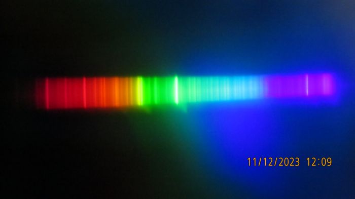 The spectrum of my Aqua Light 70W/10000K MH lamp
Despite it have such high CCT, it still have rare-earths rather than indium. I think FrontSideBus from LG, have a Sylvania 13000K color MH lamp with rare-earths, based of his photo of the arc.
