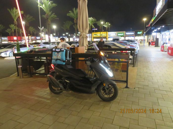 Motor scooter of Wolt at McDonalds, Big Center Kiryat Ata
The couriers of Wolt here, are known with their wild driving with their motor scooters to get as soon as possible to the homes.
