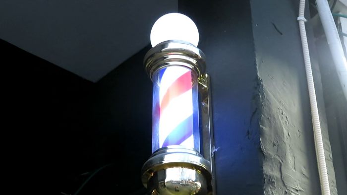 Decorative rotating LED sign with blue, white and red colors
[url]https://www.youtube.com/watch?v=xz1YdYgwGUs[/url]
It is illuminated by LEDs.
