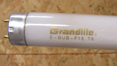 Grandlite F15T8 4100K
This came in a plastic undercabinet light. It has an odd product code but I like the gold etch. It may be a deluxe phosphor or rare earth phosphor lamp - the light is more pink and less yellow-green than a typical cool white lamp, but the CRI still isn't very good, so I'm not sure.
