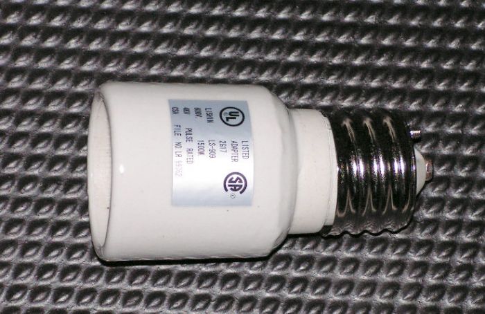Mogul socket extender
Pulse-rated ceramic socket extension for E39 mogul-base lamps. Handy for installing smaller lamps in fixtures designed for larger lamps, i.e. BT28 250w lamp in a fixture designed for BT-37 400w lamps.
