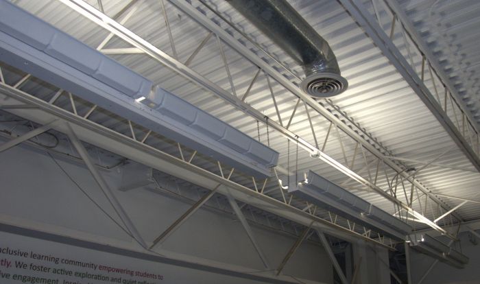Fluorescent "turret" highbays used as uplights
Spotted at a school. These look to be standard fluorescent high bays that have been mounted upside down for indirect lighting.
Interestingly these are 277 volt fixtures.
Keywords: Indoor_Fixtures
