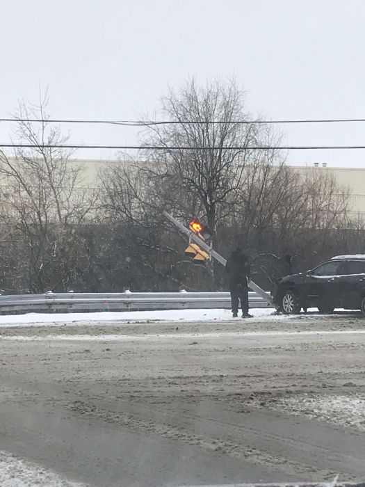 Oops!
Noticed this today on the roads after a small snowfall this morning. The fortran signals were still operational! By now theres either a new pole and likely even new pedestrian signals or a wooden pole with pedestrian signals
