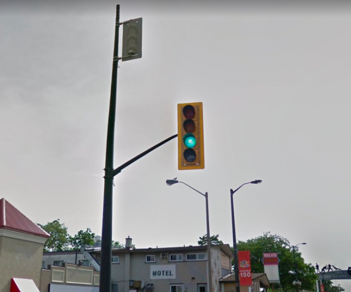 Very High Signal
Seen this while in Niagara falls Ontario on the weekend, never seen a traffic signal mounted so high up before. 

Also in 2012 all the R37's, and AE 113's were taken down and painted black and put back up. 

(Google streetview capture)
