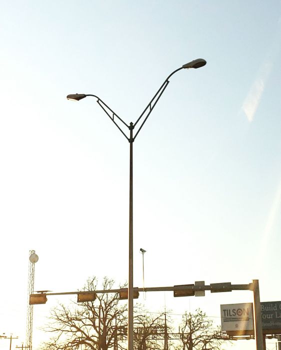 Two Cooper OVWs
At an intersection.

In Wyldwood, TX.
Keywords: American_Streetlights