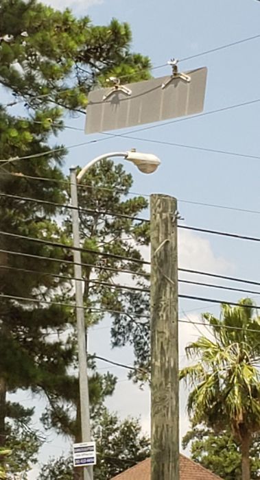 AEL 113 70w HPS streetlight (GONE)
Picture taken May 26, 2019. 

At an intersection. A better pic of this fixture, than last year's.
Keywords: American_Streetlights