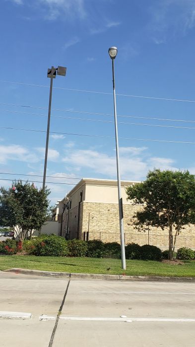Slanted streetlight pole
Picture taken on May 27, 2019 

Any ideas what caused this to be slanted?
Keywords: American_Streetlights