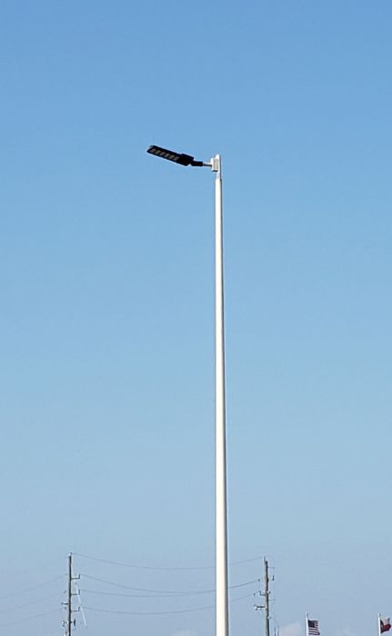 Cheap LED fixture
Picture taken on November, 30 2019 

At a parking lot.
Keywords: Misc_Fixtures