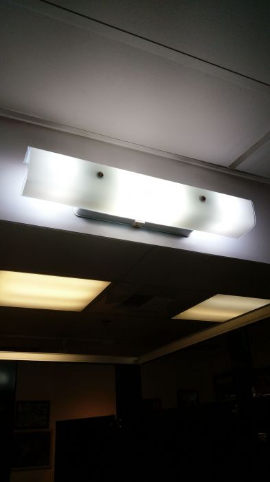 Restroom fixture
It has 5000K LED bulbs in it.
Keywords: Lit_Lighting