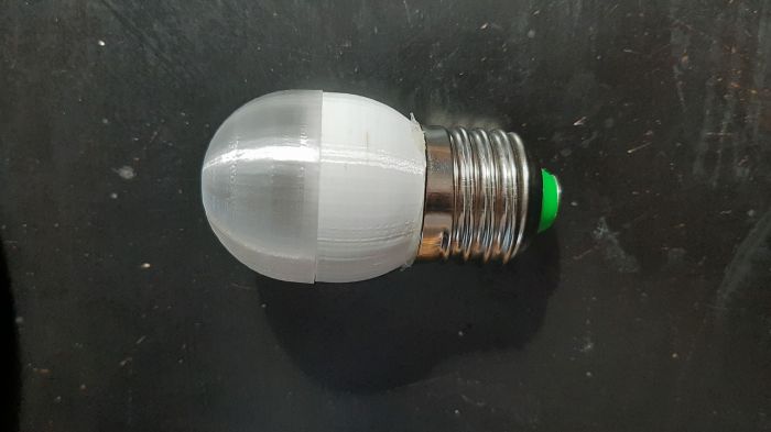 Homemade neon bulb 
Here's the bulb with the cover on. The entire thing is 3D printed from PETG which is extremely durable.
