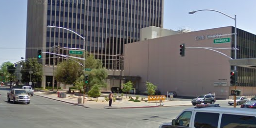 3rd Street and Bridger Avenue
A double guy mast arm traffic signal attachment combined with a single point curved mast arm overhead lamp attachment in downtown Sin City. 
Keywords: Traffic_Lights