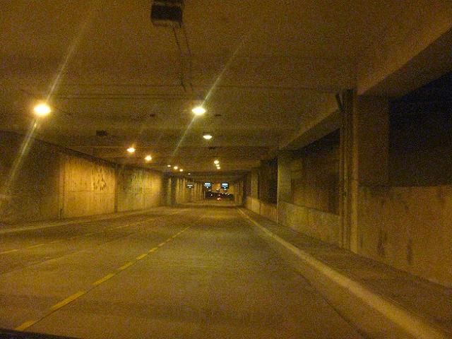 Driveway Under the Garage
Lit by yucky HPS lights. Some lights failed.
Keywords: Lit_Lighting