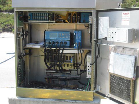 Econolite cabinet and controller
Inside of an Econolite cabinet, with ASC2000 controller, MMU1600 conflict monitor and detector rack in upper left.
Keywords: Traffic_Lights