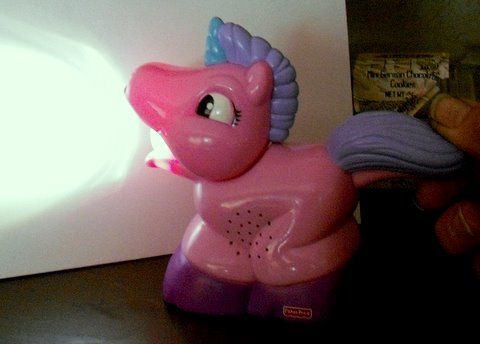 Pony Light
Squeezing the tail opens the mouth and turns on a LED as well as "whinnys". Well liked by a 4 year old niece. Made in China as usual.
Keywords: Misc_Fixtures