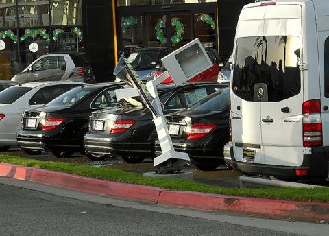 Wind Damage
Strong winds caused a lot of problems here in So Cal. lot of blackouts, trees down, ect. This pole fell on a car at a Mercedes-Benz dealership. It looks like the base rusted to the point it was no longer strong enough to withstand the winds.
Keywords: American_Streetlights