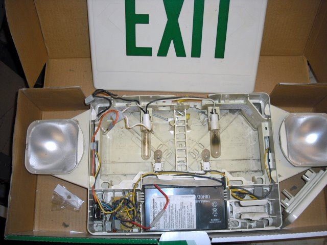 Lithonia Exit Sign with "Bugeyes"
Has 2 15w 145v tubular lamps, 6v bulbs for emergency use. Battery in lower center, charger/transfer cicuit lower left. Primary voltage is either 120 or 277v/
Keywords: Indoor_Fixtures