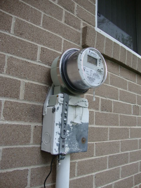 Closeup Of Meter
The meter is only a few years old, in fact I saw it installed 3 years ago, they had to use an adapter since the old meter was a different type.
Keywords: American_Streetlights