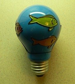 GE 25 Watt Fish Bulb
Painted underwater fish scenes on an light blue 25 watt GE bulb, found this at a Dollar Tree about  6 years ago. 
Keywords: Lamps
