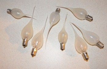 Rubber Covered C-7 Candle Wax Bulbs
 Silicone rubber covered silicone covered C-7 bulb. These are used in crafts style electric candle lamps that had been available in gift shops and country crafts shops. 1990's,00's vintage, Chinese made.
Keywords: Lamps