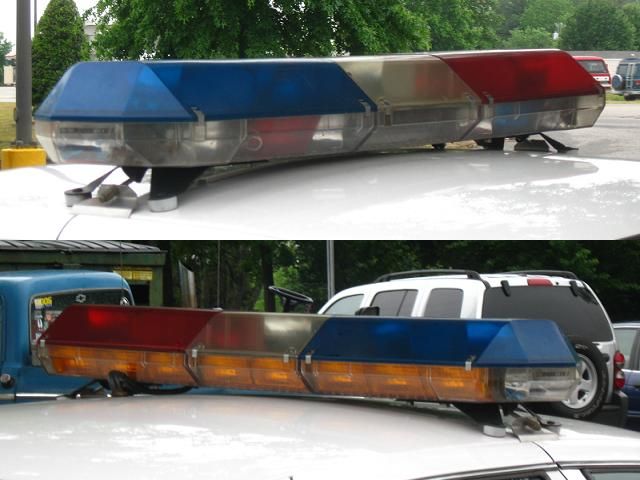 Durham Police Department
Only red-white-blue lightbar I have seen in NC area. They're usually all blue. All halogen lightbar. You can find these things all over ebay! Only one thing I suggest you never do. DO NOT put them on your car EVER! Civilians can own them for display only!

This is a Code 3 MX-7000.
Keywords: Misc_Fixtures