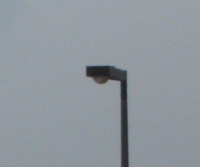 Wierd Fixtures 
And there triangular! They also use OV-25 reractors, and are 150 watt HPS! 
Keywords: American_Streetlights