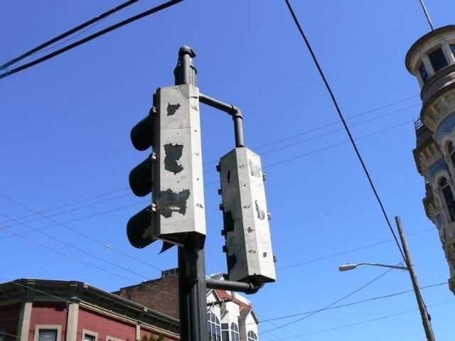 McCain traffic signals
are pure junk! Powdercoating is gone, and the aluminum is corroding into white powder! Not to mention the top of one of them is cracked through in through... low-quality casting!
Keywords: Traffic_Lights