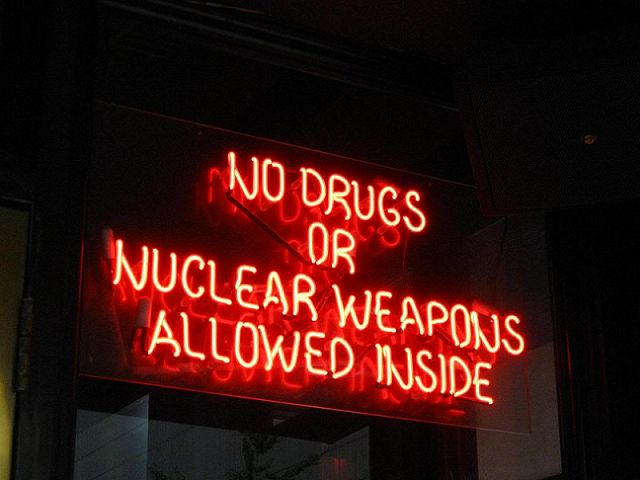 No nuclear weapons allowed!
Great! Now I have to go back to my car and put my 50 Megaton nuke before I go in the store. I am pretty sure there isn't a Nuke 'R' Us somewhere on Earth.

Thanks to a good friend for saving me a headache of finding this pic on my HDD.
Keywords: Indoor_Fixtures