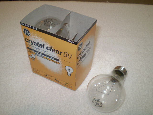 General Electric Crystal Clear 60
General Electric Clear 60 Watts light bulb.

Lamp Shape: A19
Voltage: 120 Volts
Lumens: 870
Lamp Life: 1000 Hours
Factory Location: USA
Base: [Medium] (one-inch) Edison Screw (E26)
Filament Type: C-6
Keywords: Lamps