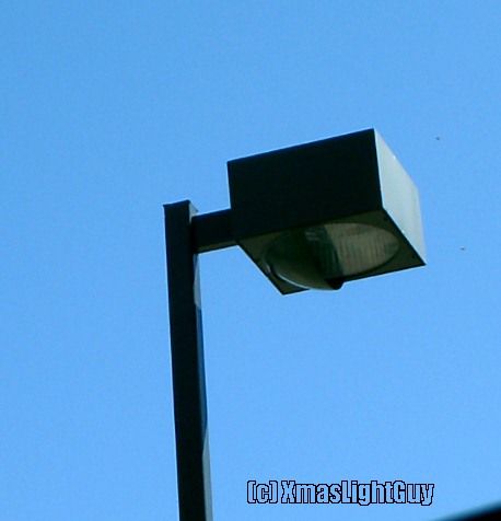 StreetLight #030 - Parking Lot Streetlight 
Fairly common looking parking lot light .. but it was right there & I had the camera with me LOL

Location
Goodwill store parking lot
Belleview & Simms, Jefferson County, Colorado 
Keywords: American_Streetlights