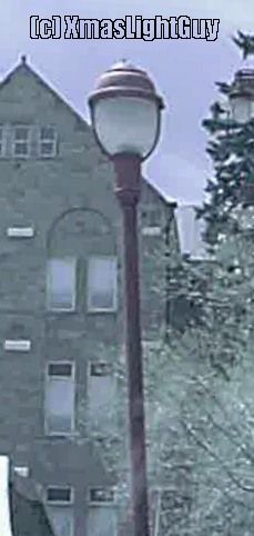 StreetLight #136
Post-top streetlight .. painted red-ish in color (not sure if that is original) but I like the way it looks
(image quality isn't the best since it was a frame-grab from a video taken in a moving car)


Location: 
University Of Denver - CO
Keywords: American_Streetlights