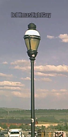 StreetLight #225
A nice old post-top streetlight (no idea on its actual age, or make/model though, also don't know if its MV or HPS)

I've been wanting to get a pic of this one for quite awhile now & finally did last weekend.
(pic isn't the best since its a frame-grab from video taken from a moving vehicle)


Location:
Fairplay CO
Keywords: American_Streetlights