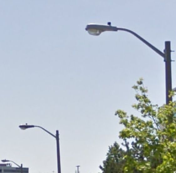 Model 13
I discovered while out today that there are now 2 Model 13's I know of currently in my city.  First time seeing one of these on a short pole and arm like this.

Yes this is google streetview but I was unable to get a proper photo because I didn't have my phone on me at the time.
Keywords: American_Streetlights