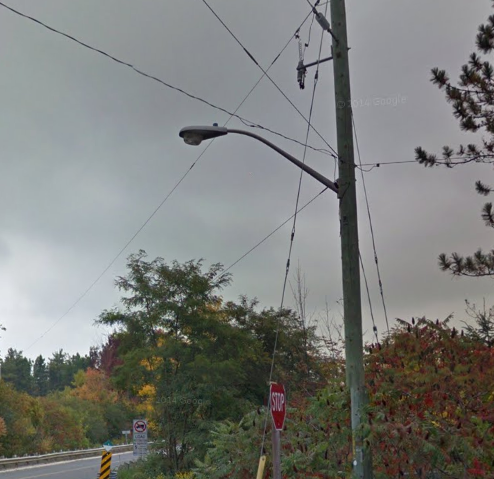 Look at this gem
I was driving her the other day and I saw this light as I drove by and I found the streetview of it. An old B2217 in Caledon at the end of Chinguacousy Road and Old base line
Keywords: American_Streetlights