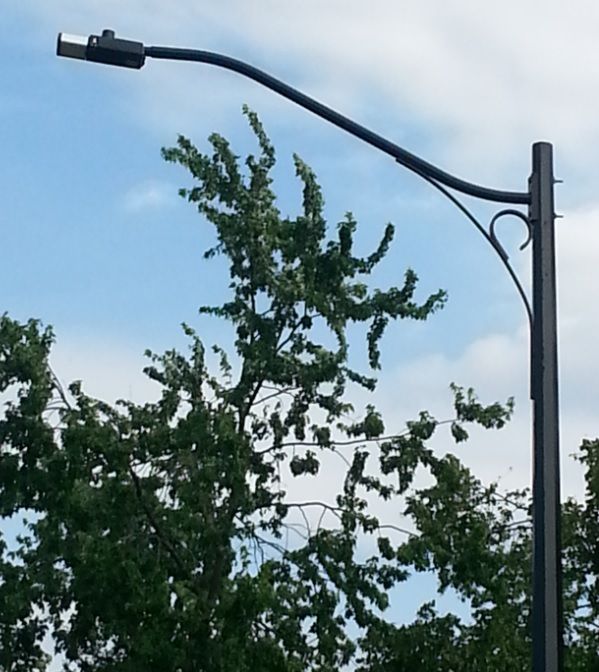 Cooper NVN
New is installs in March on a street nearby my house that replaced post tops with these decorative arm and poles with Cooper NVN's
Keywords: American_Streetlights