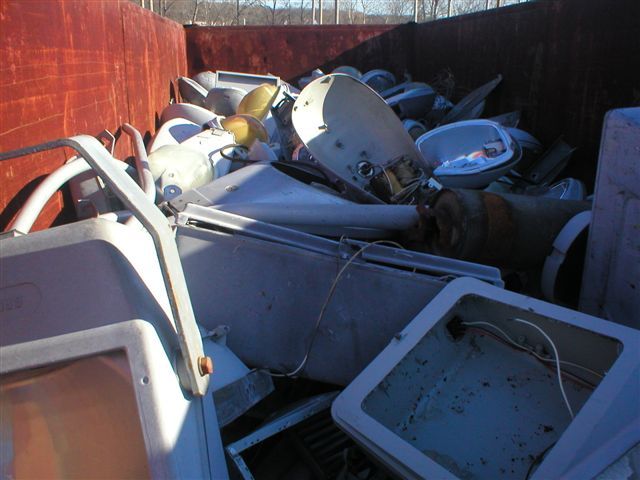 Massachusetts Street Light Dumpster Pic 6
These pics are courtesy of Joe Maurath Jr. Thankfully, most of the mercs that were in good condition went right from here to Joe's house. Look at all that loot! I see some perfectly usable mast arms in there too. Grrrr...
Keywords: American_Streetlights