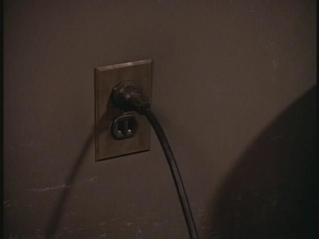 1940's NEMA Outlet
As Data walks toward Dr. Beverly Crusher with the victim, the plug is unplugged.

The Big Goodbye (#1.11)

Time index: 30:09
Keywords: Lights_Camera_Action